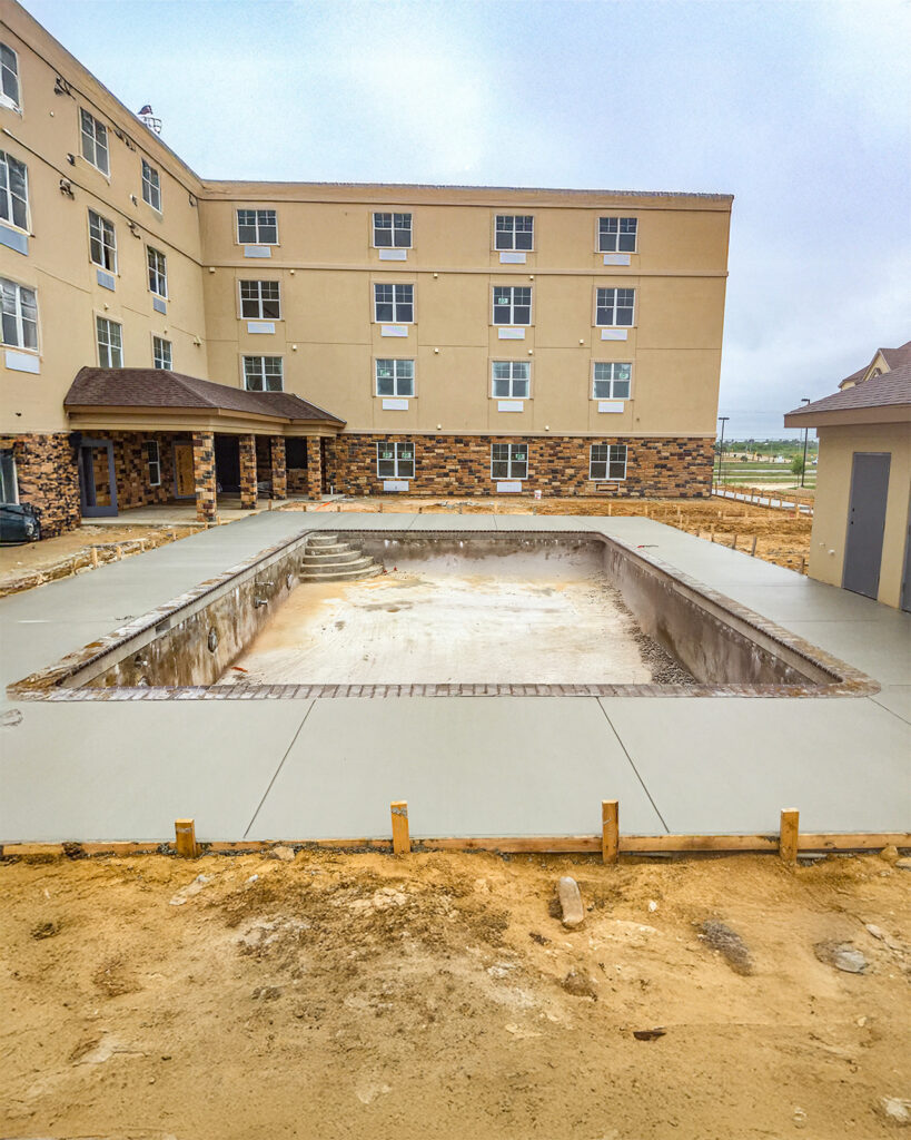 Concrete finish around a hotel pool in South Centeral Texas